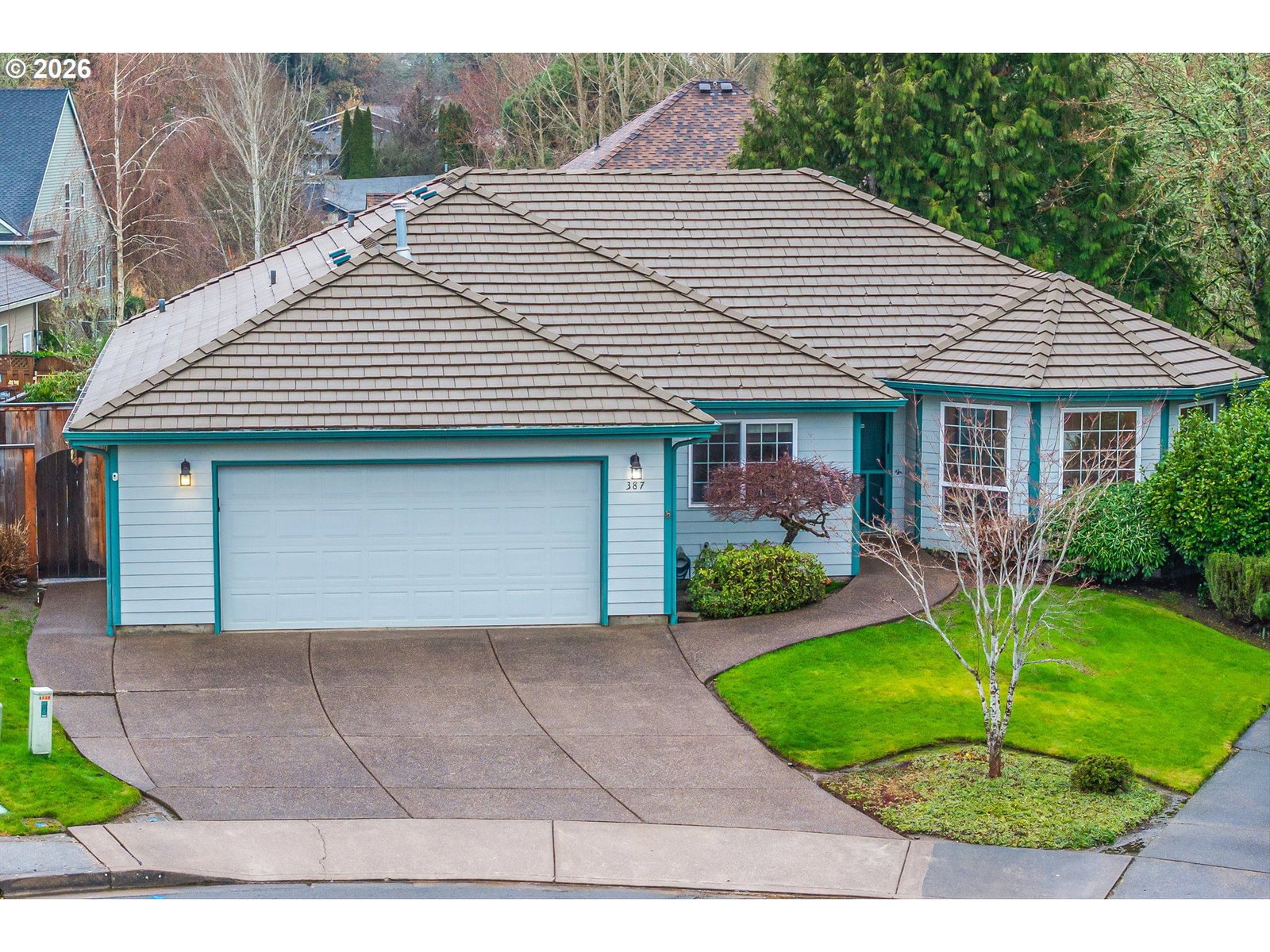 387 NE 15TH CT
